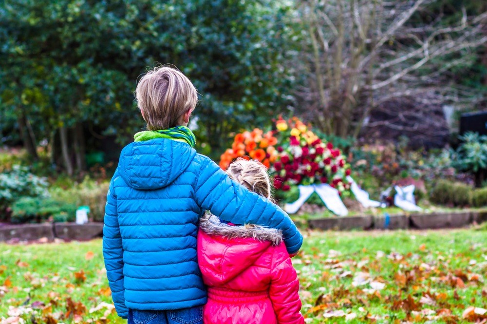 Young children at grave